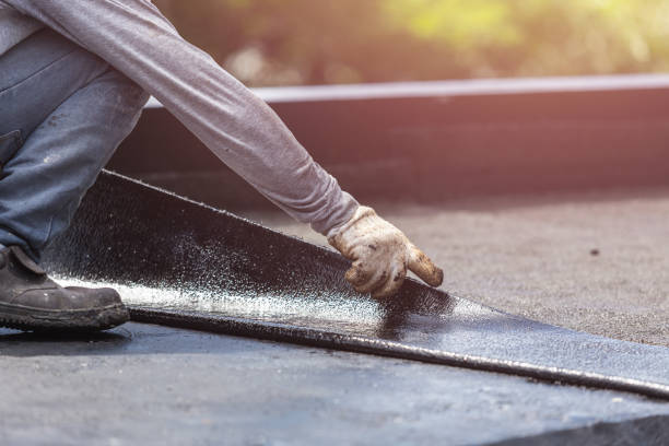 Professional Basement Waterproofing technician working in Kintnersville, PA